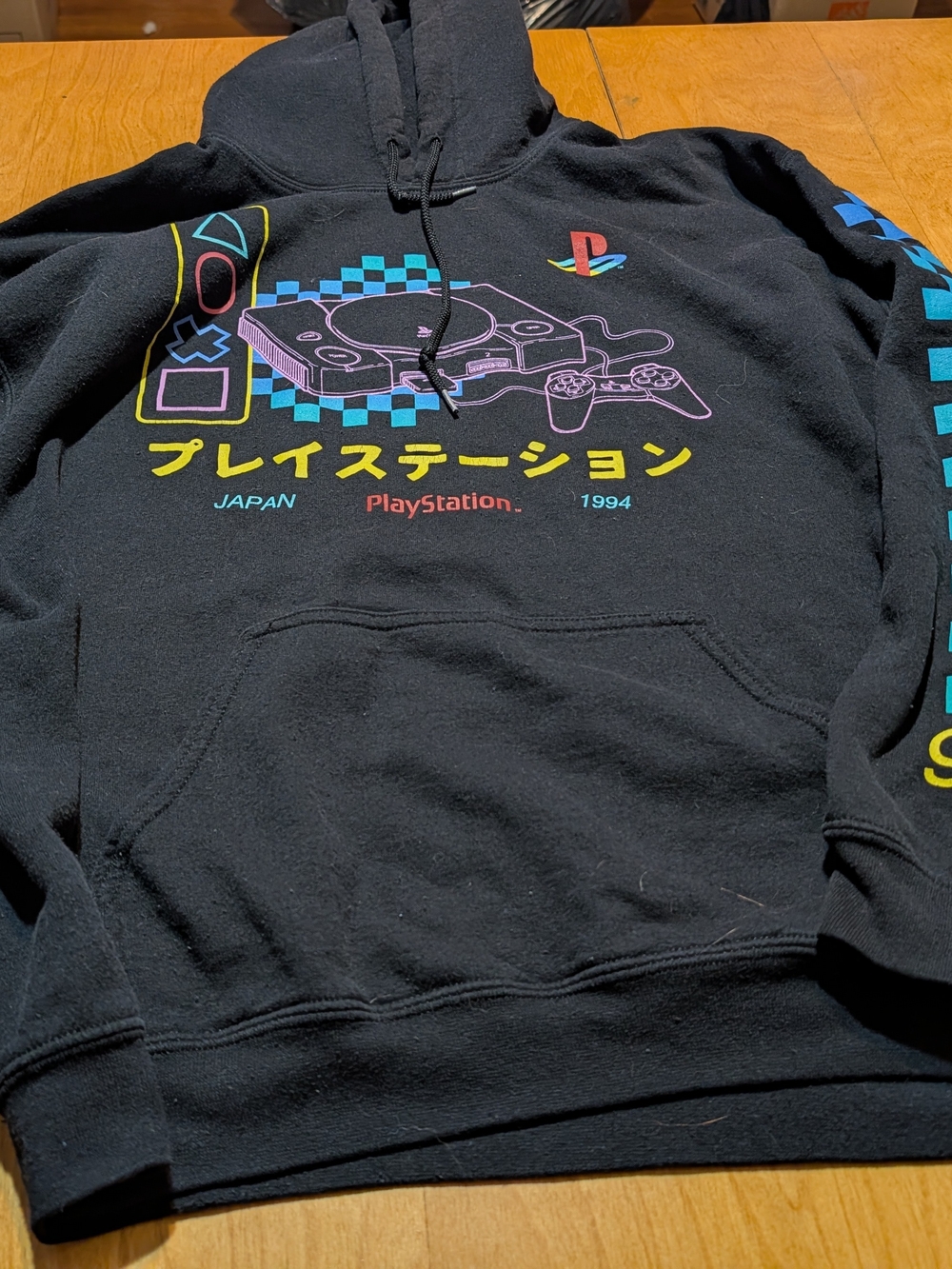 Sony Black PlayStation Retro Graphic Hoodie with Neon Accents